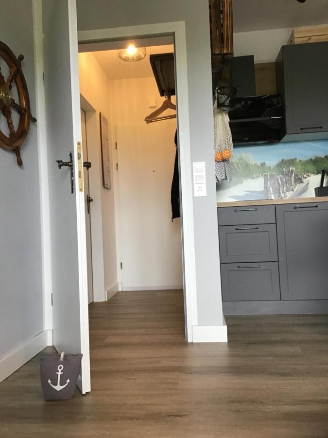 Liebevoll Eingerichtete Ferienwohnung Luettje Koje Dornum Bagian luar foto